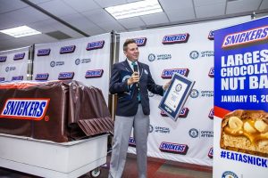 Snickers gobbles up a world record, Delta staff bonuses earn kudos, and Edelman reports consumer trust at all-time low