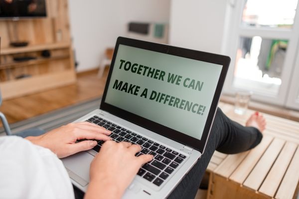 Word writing text Together We Can Make A Difference. Business photo showcasing be very important some way in like team or group woman laptop computer office supplies technological devices inside home