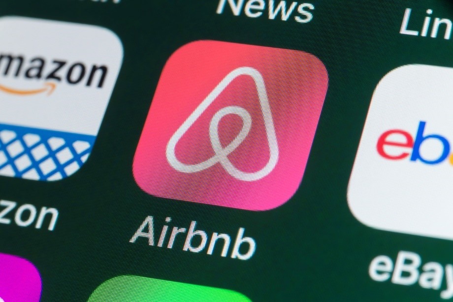A picture of the Airbnb app is shown.
