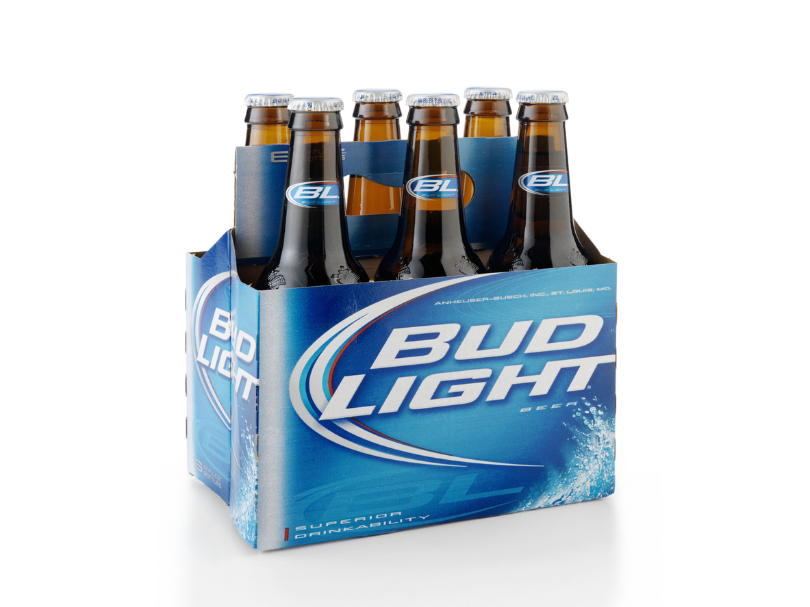 Six Pack of Bud Light Beer Bottles. Bud Light has been under fire in the last few months because of abandoning trans actor Dylan Mulvaney in the midst of their company crisis.