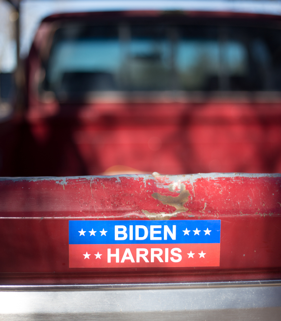 Santa Fe, NM: A 2020 political bumper sticker on an old red pick-up truck. Close-up shot. Kamala Harris is looking to boost her image and Biden's in time for 2024.