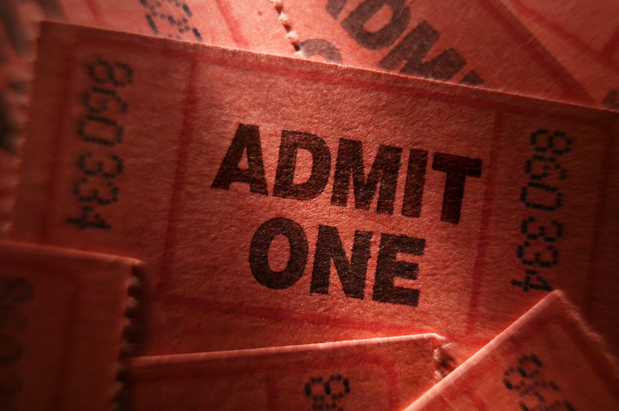 Close up of admission tickets. The Sound of Freedom movie director responds to QAnon controversies too little too late.
