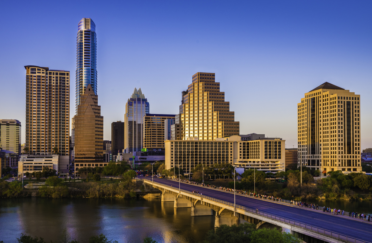 Austin Texas cityscape skyline panorama, Congress Avenue Bridge, late afternoon.
